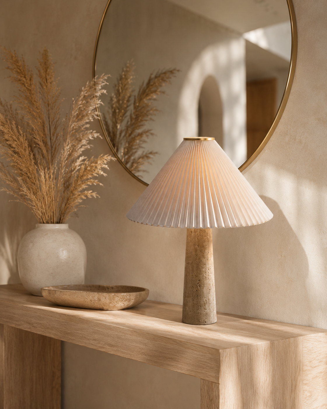 Riviera Travertine Pleated Table Lamp on nightstand in bedroom setting